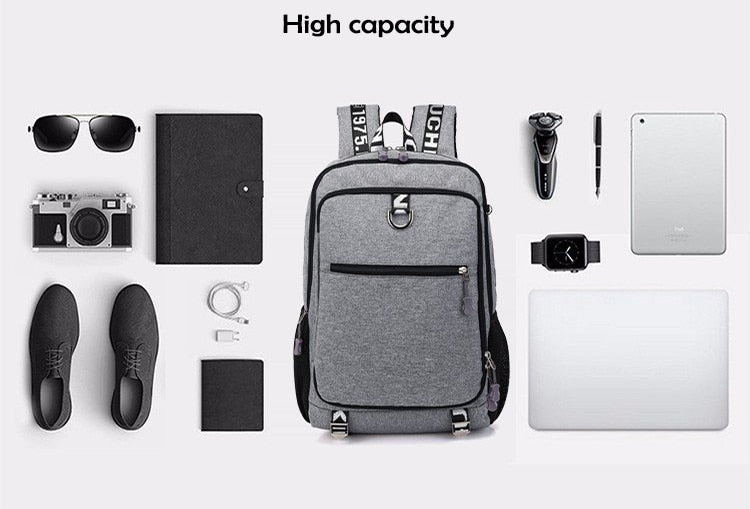 Male waterproof casual student backpack with USB charging port and laptop compartment