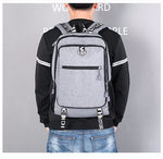 Male waterproof casual student backpack with USB charging port and laptop compartment