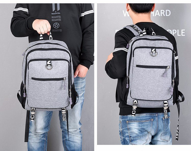 Male waterproof casual student backpack with USB charging port and laptop compartment