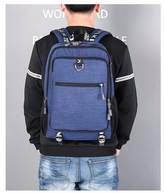 Male waterproof casual student backpack with USB charging port and laptop compartment