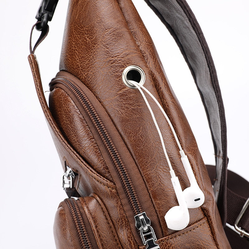 Men's leather cross-body bag for men for travel, with USB connector for charging a smartphone