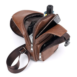 Men's leather cross-body bag for men for travel, with USB connector for charging a smartphone