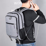 Male waterproof casual student backpack with USB charging port and laptop compartment