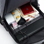 Male waterproof casual student backpack with USB charging port and laptop compartment