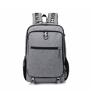 Male waterproof casual student backpack with USB charging port and laptop compartment